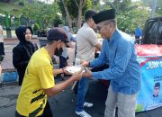 Aksi Sosial Paslon Bagus, Bagi Bagi Ratusan Nasi Kotak di Jumat Berkah